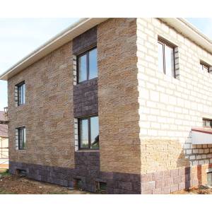 Облицовка стен дома из газосиликатных блоков фасадной плиткой Валаамский камень с оцинкованными закладными